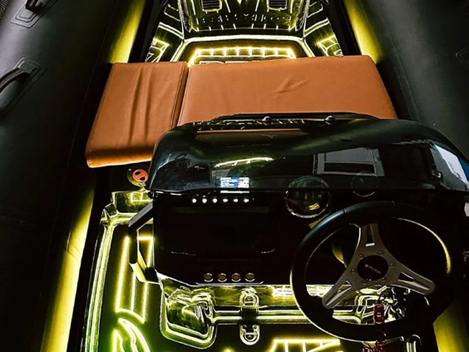 Installed DEXLIT deck with an illuminated pattern in a RIB cockpit at night